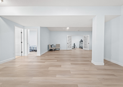 New-build home with clean and modern lines, traditional wooden floors, and light interiors.
